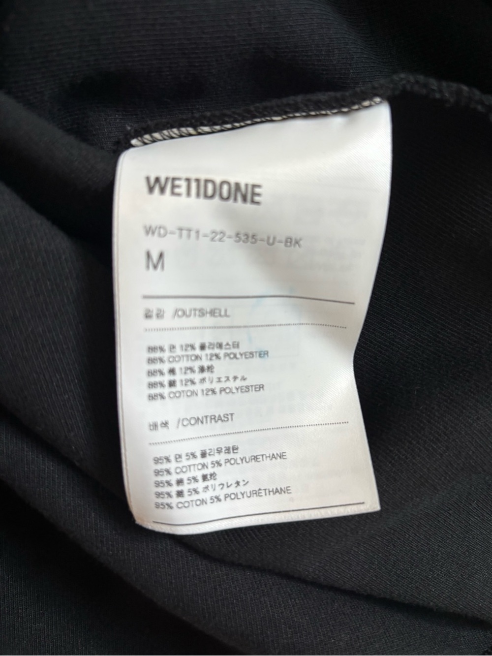 Men's Black V-Neck Sweater with White Geometric Accents - Picture 5 of 7